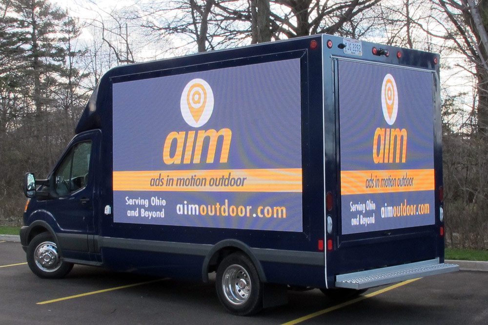 Ads In Motion Outdoor - A Picture of a company mobile billboard advertising truck.